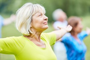 Active seniors in a yoga class